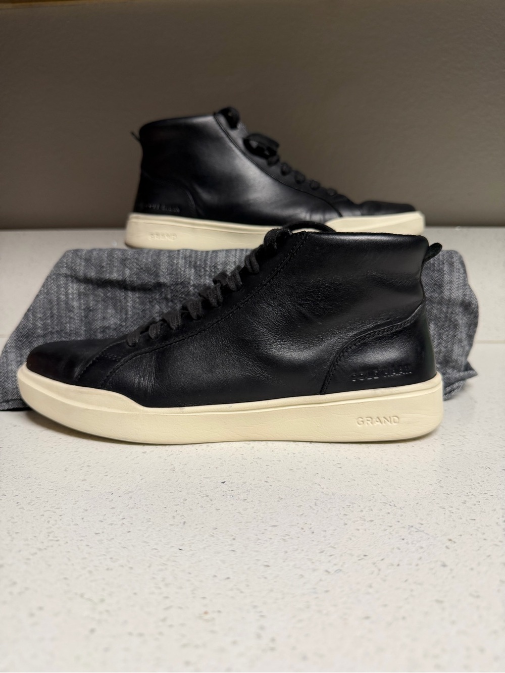 Cole Haan Black Leather High-Top Sneakers with Cream Sole